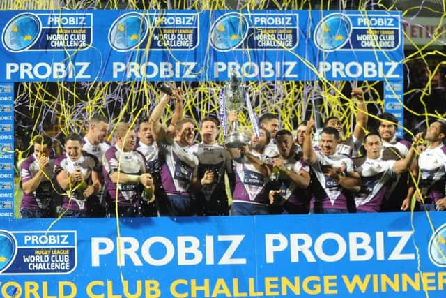 Melbourne Storm lift the World Club Challenge in 2013.