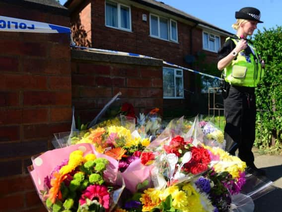 Flowers left at the scene of the incident