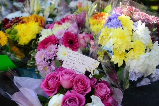 Flowers left at the scene of the incident