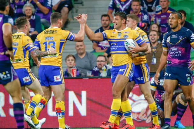 Ryan Hall celebrates after scoring the opening try against Melbourne Storm.