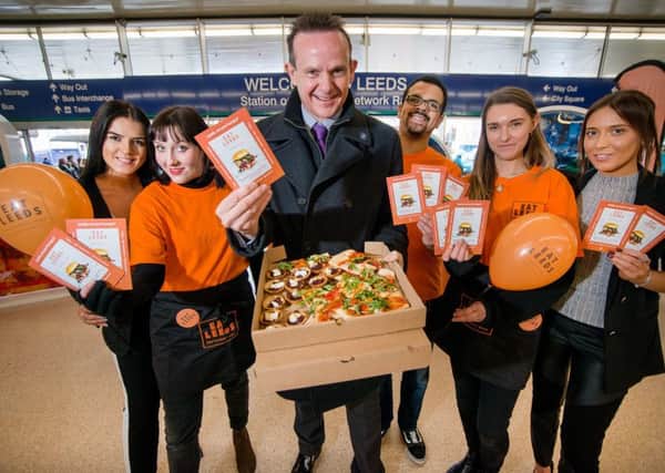 ROLL UP, ROLL UP: A promotion for Eat Leeds Restaurant Week at the citys railway station. PIC: Simon Dewhurst