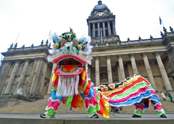 18 February 2018 .......       Chinese Lion Dance on the Town Hall steps by the Leeds Chinese Communitee Association Lion Dance Troupe at the Chinese New Year festival celebrations at Leeds Town Hall. Picture Tony Johnson.