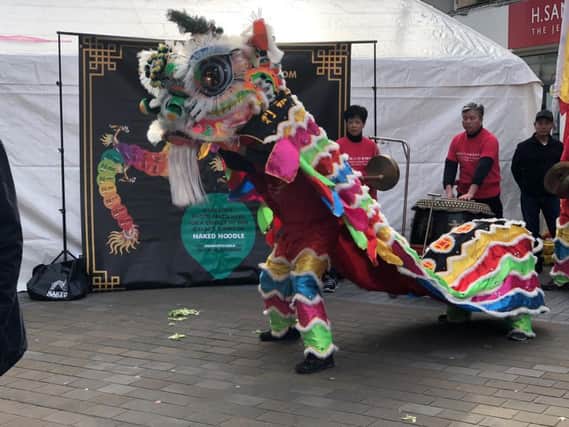 Traditional dance of the lion for Chinese New Year.