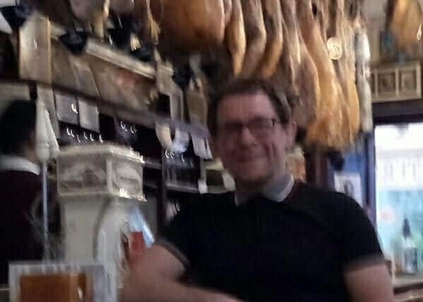 Chris hams it up in typical tapas bar