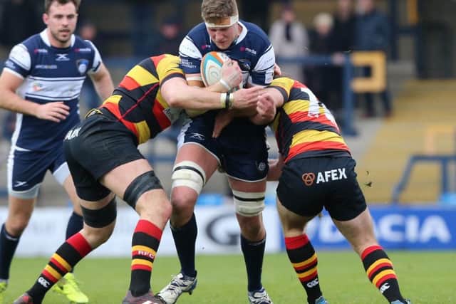 Richard Beck powers into the Richmond defence. PIC: Varley Picture Agency