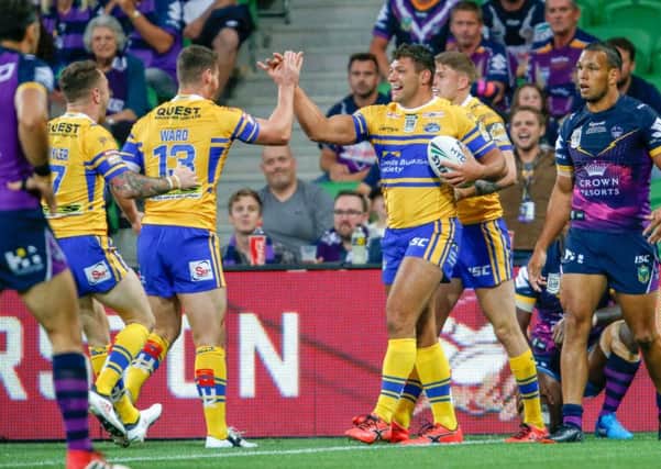 Ryan Hall of Leeds Rhinos celebrates after scoring the opening try against Melbourne Storm.