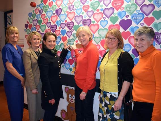 Yorkshire Children's Hospital Fund trustees visited the mural at Leeds General Infirmary as they made a donation.