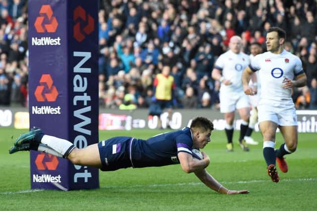 Scotland's Huw Jones scores his side's first try against England at Murrayfield on Saturday. Picture: Ian Rutherford/PA