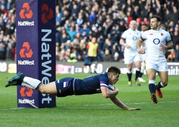 Scotland's Huw Jones scores his side's first try against England at Murrayfield on Saturday. Picture: Ian Rutherford/PA