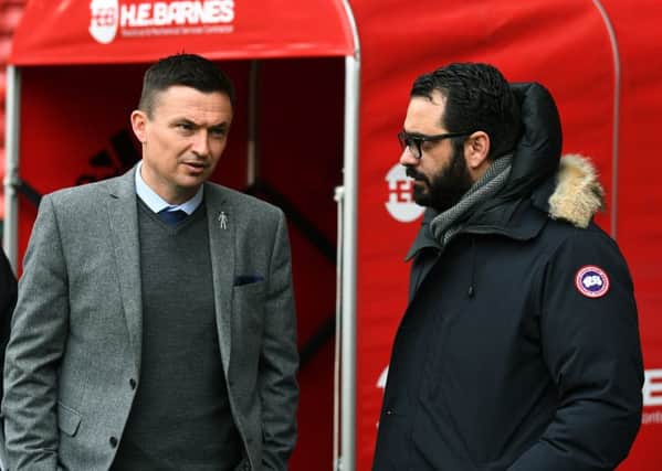 Leeds United head coach Paul Heckingbottom chats to Victor Orta at Bramall Lane earlier this month.
 Picture: Jonathan Gawthorpe