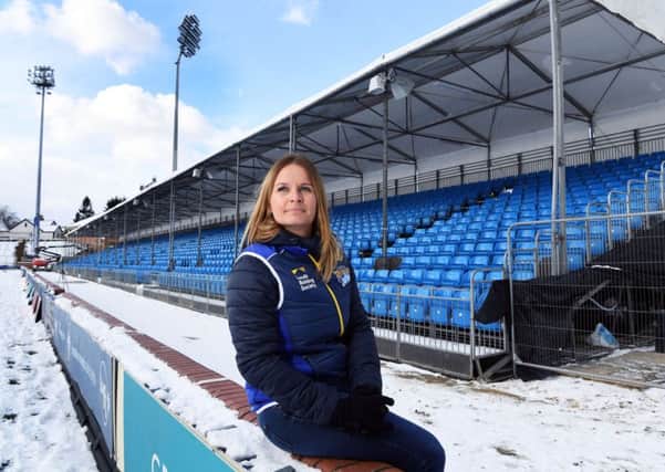 ALL SET: Sian Jones in front of the temporary North Stand at Emerald Headingley Stadium. PIC: Jonathan Gawthorpe