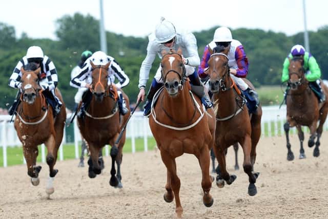 Poet's Society (centre), ridden by James Doyleto victory in the Betfred 'Bet on the Euros' EBF Novice Stakes back in 2016. PIC: Anna Gowthorpe/PA Wire