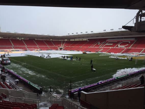 Middlesbrough groundstaff have made progress clearing the pitch of snow at The Riverside.