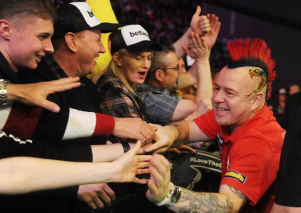 Peter Wright is welcomed to Leeds Arena last year.
