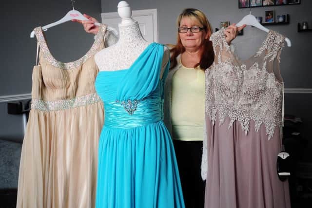 Mandy Dickinson pictured with her Prom Dresses, at her home at East Ardsley..28th February 2018 ..Picture by Simon Hulme