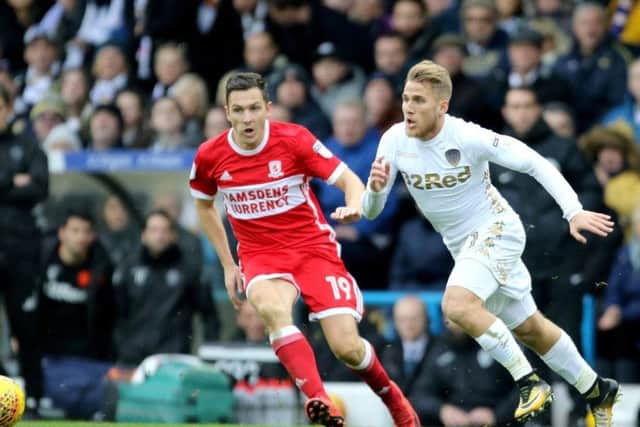 United's star man Samuel Saiz takes on Middlesbrough's Stewart Downing at Elland Road earlier this season.