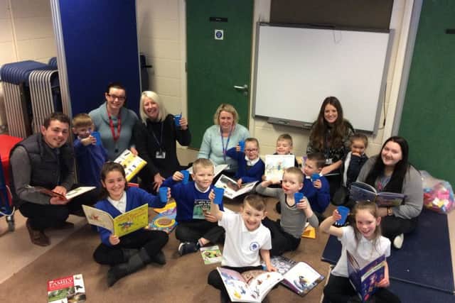 Asquith Primary School in Morley was one of the many schools forced to close yesterday, but staff provided essential childcare for parents on World Book Day.