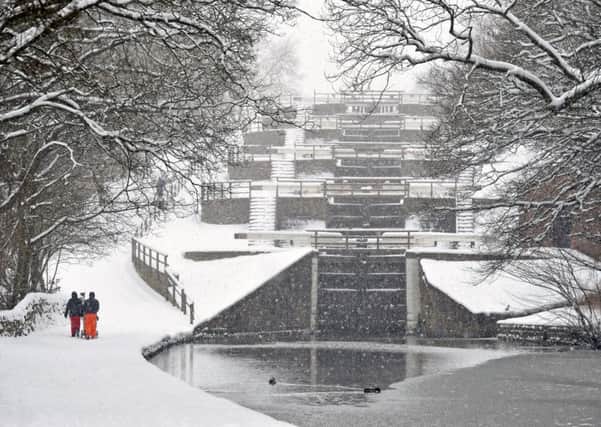Five Rise Locks on the Leeds Liverpool Canal at Bingley in the snow.