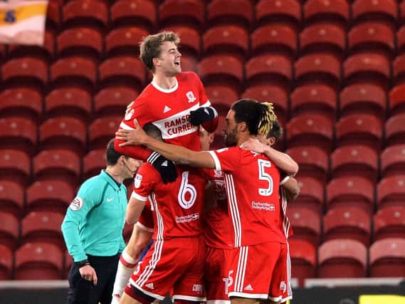 FIRST HALF DOUBLE: For Boro's Patrick Bamford, top.