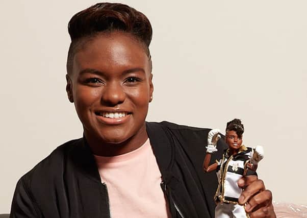 Double Olympic boxing champion Nicola Adams with a one-off first ever "boxer Barbie" as part of its Shero programme recognising women who inspire girls with their achievements unveiled for International Women's Day.