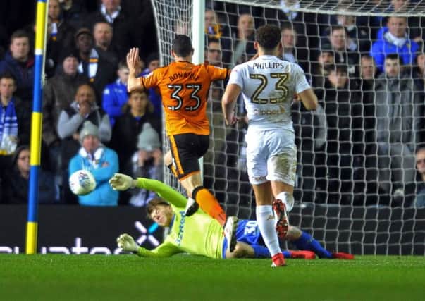 Leeds United keeper Bailey Peacock-Farrell saves at the feet of Leo Bonatini. PIC: Tony Johnson