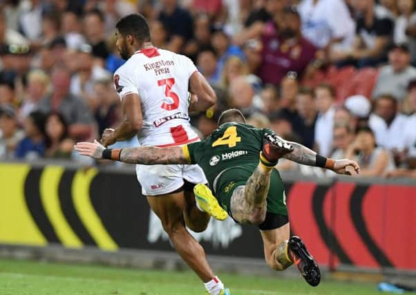 Australia's Josh Dugan Tackles England's Kallum Watkins (left) during the final of the 2017 Rugby League World Cup.
