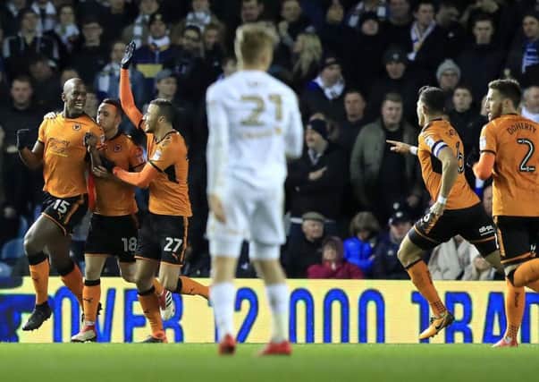 Willy Boly celebrates after doubling Wolves' lead on Wednesday.