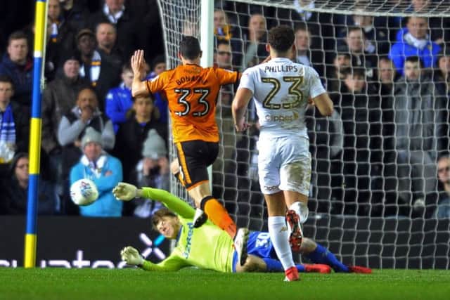 Bailey Peacock-Farrell saves at the feet of Leo Bonatini of Wolves.