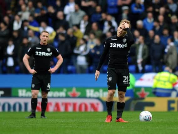 FRUSTRATION: For Leeds United's Adam Forshaw, left, and Samu Saiz, right, after Reading open the scoring but both players had decent games on the figures.