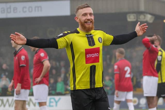 George Thomson celebrates his first goal against FC United of Manchester.