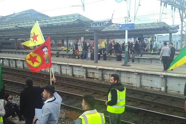 Campaigners at Manchester Piccadilly railway station. Picture: PA Wire.