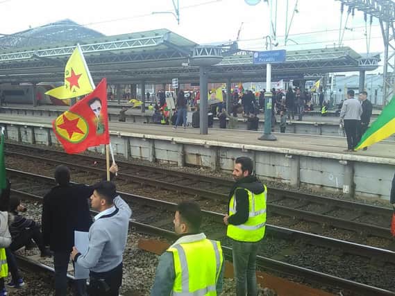 Campaigners at Manchester Piccadilly railway station. Picture: PA Wire.
