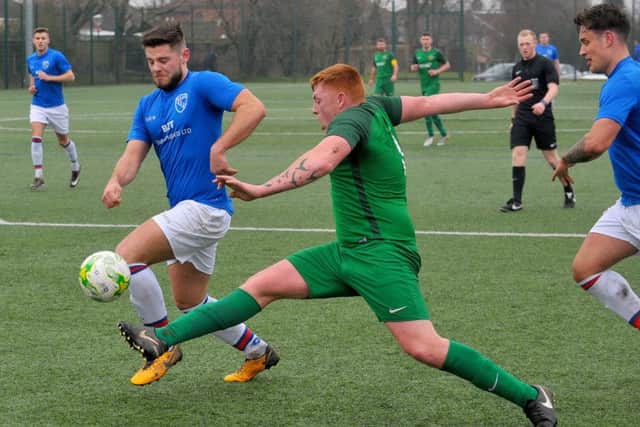 James Allan, of Beeston St Anthony's, at full stretch against visitors Horbury Town. PIC: Steve Riding
