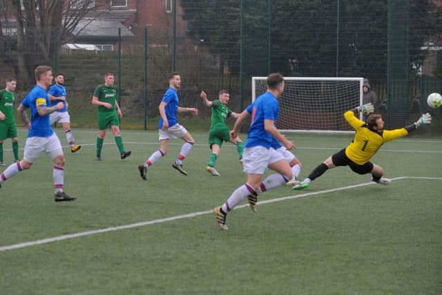 Gareth Groves scores for Beeston St Anthony's against West Yorkshire League Premier Division rivals and visitors, Horbury Town. PIC: Steve Riding