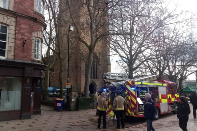 Firefighters at the scene earlier today.