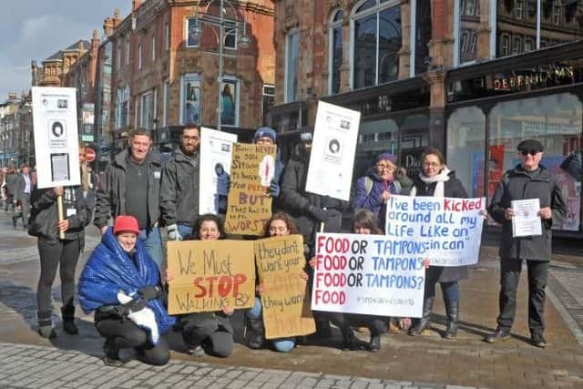 Rough sleeper charity Simon on the Streets changed its name to Simone on the Streets to highlight International Women's Day homeless women issue at Leeds Briggate rally.