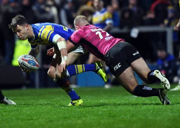 Richie Myler looks to get away from Hull's Danny Washbrook.