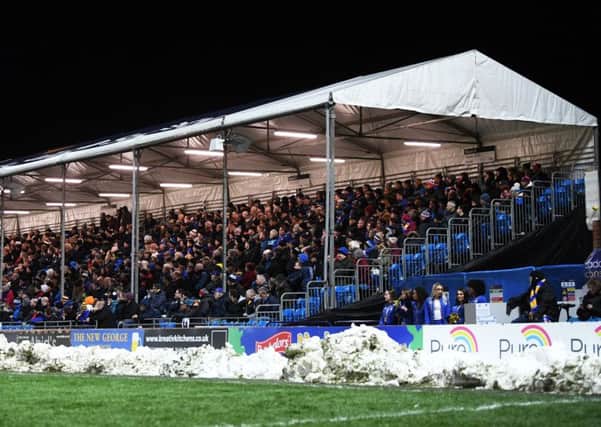 Leeds Rhinos fans in the temporary stand at Headingley.