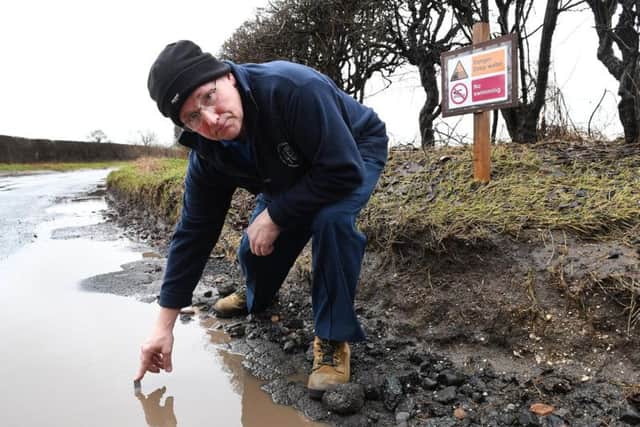 You'd better not try to swim in this six-inch pothole