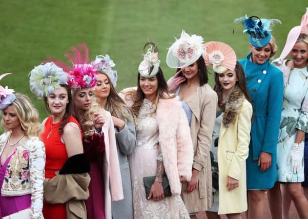 Miss England Stephanie Hill  with Miss Cheltenham finalists during Ladies Day of the 2018 Cheltenham Festival at Cheltenham Racecourse.  David Davies/PA Wire.
