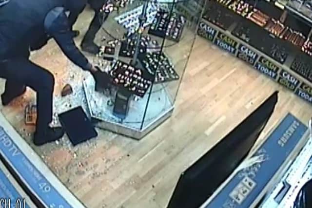 CCTV footage shows the gang raiding the shop with their machetes.