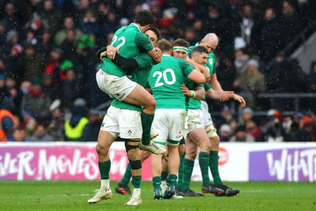 Ireland's Conor Murray and Joey Carbery celebrate winning the grand slam at Twickenham