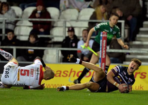 Ash Handley touches down for the Rhinos third try at St Helens. PIC: Bruce Rollinson