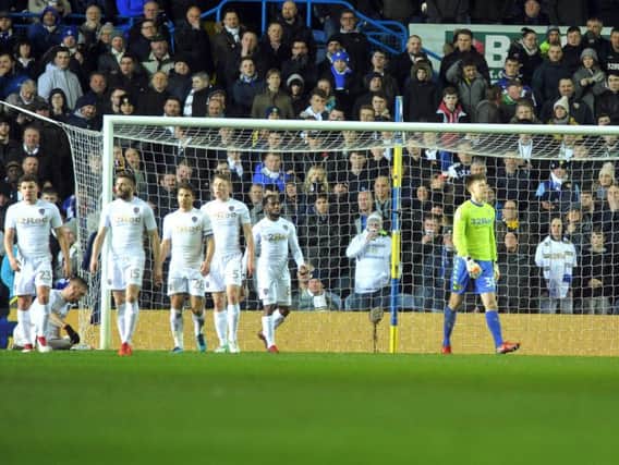 Leeds United players react during the 3-0 defeat to Wolves earlier this season.