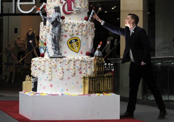 SWEET: Dan Wharton from Trinity Leeds with the giant birthday cake.