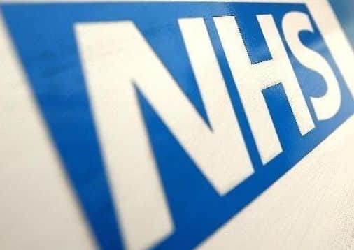 NHS logo.