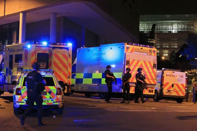 Armed police at Manchester Arena. Photo:  Peter Byrne/PA Wire