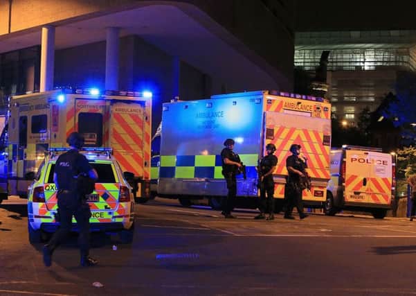 Armed police at Manchester Arena. Photo:  Peter Byrne/PA Wire