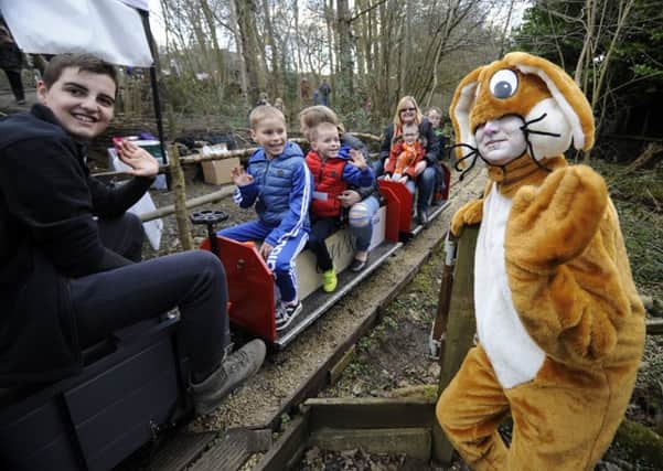 HOP TO IT: The Easter Bunny waves at riders on Churwell Woodland Railway. PIC: Simon Hulme