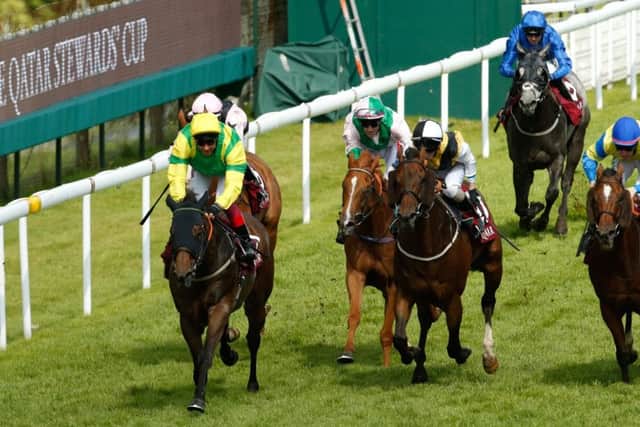 Lancelot Du Lac ridden by Frankie Dettori (left) winning The Qatar Stewards' Cup Handicap at Goodwood last August. PIC: Paul Harding/PA Wire